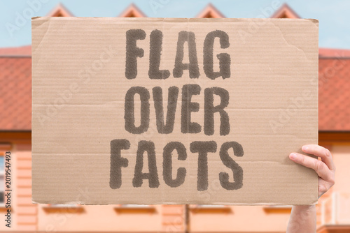 Foto "Flag Over Facts" Patriotic symbols are placed above factual evidence to shut down criticism