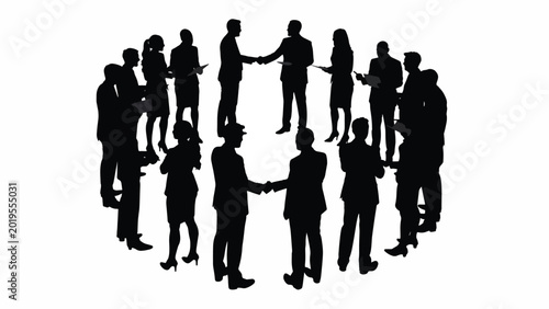 Silhouette of business people shaking hands.