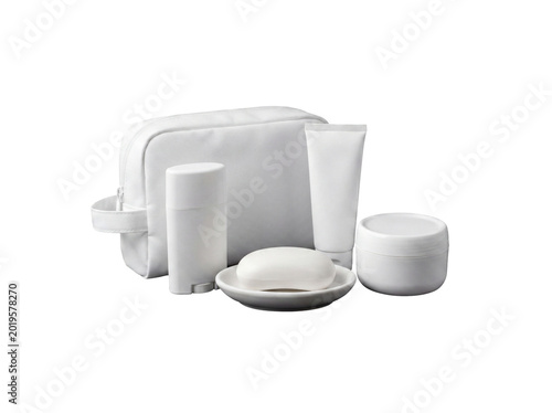 Vászonkép White personal care essentials with a toiletry bag, including soap, cream, and deodorant, isolated