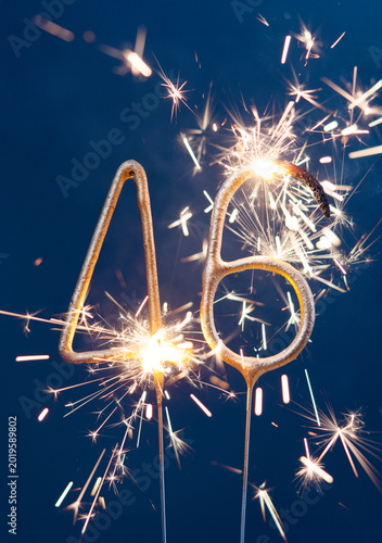 Konstfotografi 46 years anniversary celebration festive background made with Bengal fires in the form of number Forty six