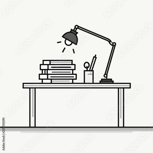 Desk lamp on a workspace surface.