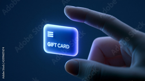 Hand holding a glowing digital Gift Card icon on a virtual blue interface, online shopping rewards and loyalty program concept