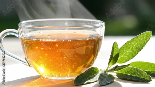 Warm Sage Herbal Infusion in Clear Glass