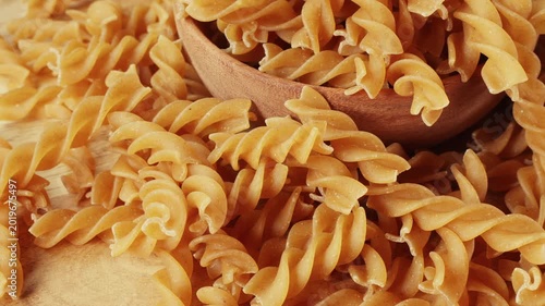 Wholewheat Fusilli pasta close up stock footage