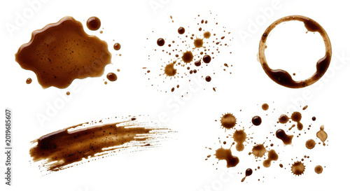 Collection of brown coffee splashes splatters and cup rings shown from above