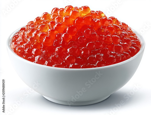 Bright red salmon roe generously piled high in a simple white ceramic bowl against a white background