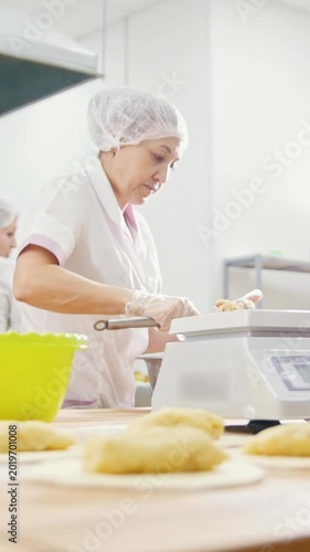 The employees of the bakery work
