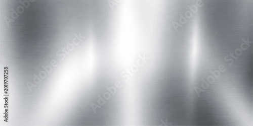 Photos A polished silver brushed metal texture background with a shiny metallic stainle