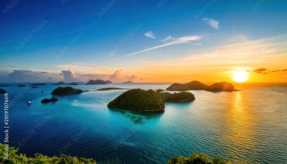 Fototapeta premium Breathtaking sunset over tropical islands in Raja Ampat, Indonesia.