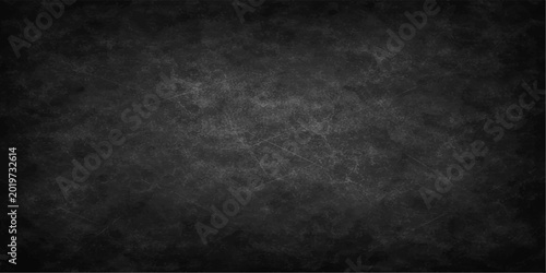 Quadro su tela A dark vintage black and white chalk grunge background with a blank textured gra