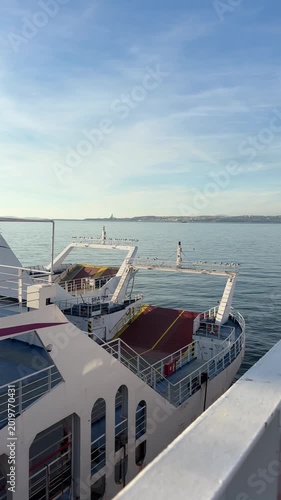 Panning video of the exterior structure of a passenger ferry sailing at sea