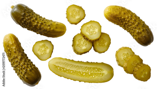 Photos Whole and sliced gherkin pickles with bumpy texture, isolated on transparent bac