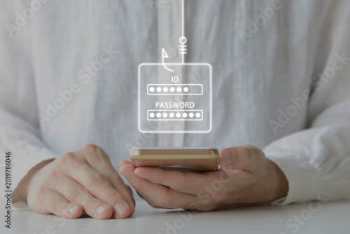 Obraz na płótnie スマホ上でIDとパスワードが盗まれるフィッシング被害に遭っている人物