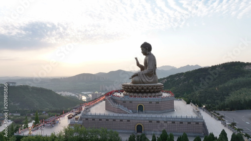 Photos The Great Buddha of Mengshan in Taiyuan Shanxi at sunset with panoramic mountain