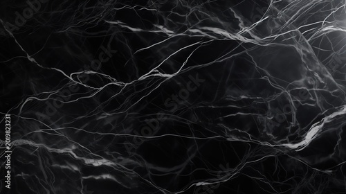 Luxury black marble texture background with modern white veins. Abstract stone pattern ideal for elegant wallpaper, architecture, and interior design.