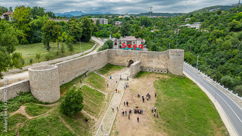 Citadel of Shusha with visitors and greenery surrounding the fortress in Qarabaqh, Azerbaijan