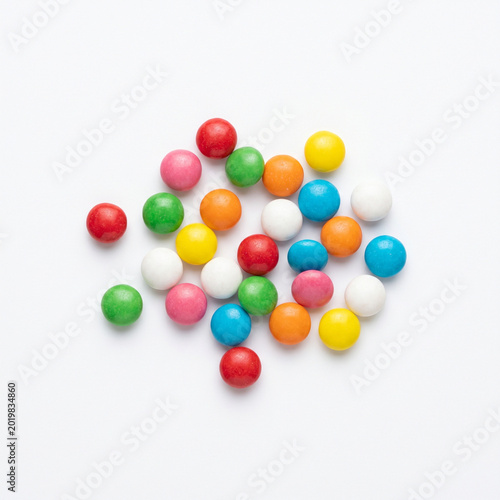 Mini gum candies isolated on white background with colorful design  