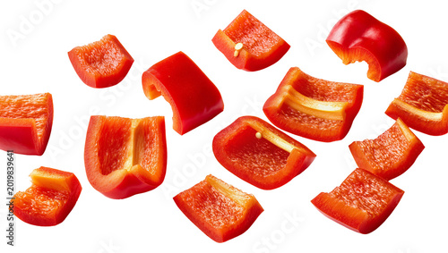 Foto Scattered red bell pepper pieces fresh and vibrant, isolated on transparent back