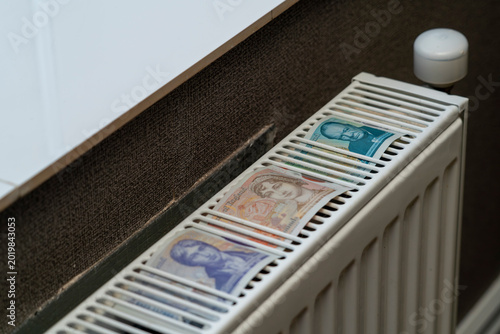Foto Currency placed on a radiator at a location in the United Kingdom