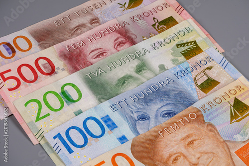 Fotografie Various denominations of Swedish kronor arranged on a surface