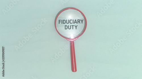 Fotografía Magnifying glass focuses on the concept of 'Fiduciary Duty', highlighting its im