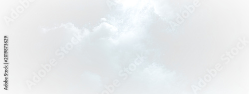 Slika na platnu Soft white and pale blue clouds drift across a bright sky on a transparent backg