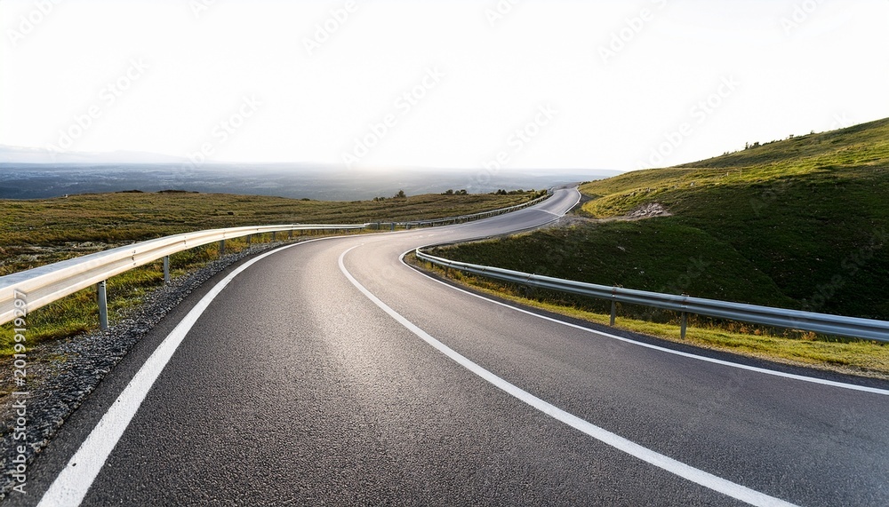 Obraz premium a winding road curves and disappears into the distance isolated on white