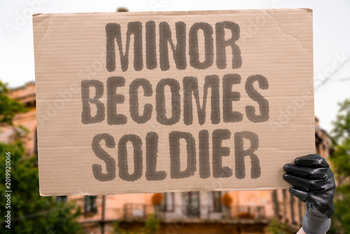 Foto "Minor Becomes Soldier" The transition from minor to soldier is forced and violent in active war zones