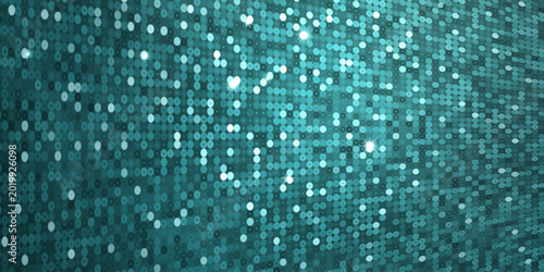 A textured background of teal and turquoise sequins in varying shades. Bright...