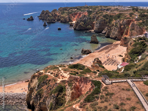 Fotografie Aerial drone view of Praia Dona Ana beach and cliffs in Lagos Algarve Portugal