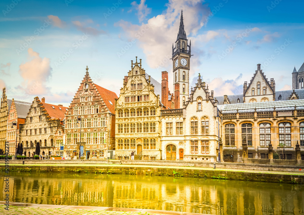 Obraz premium Old buildings on Graslei embankment at day, Ghent, Belgium