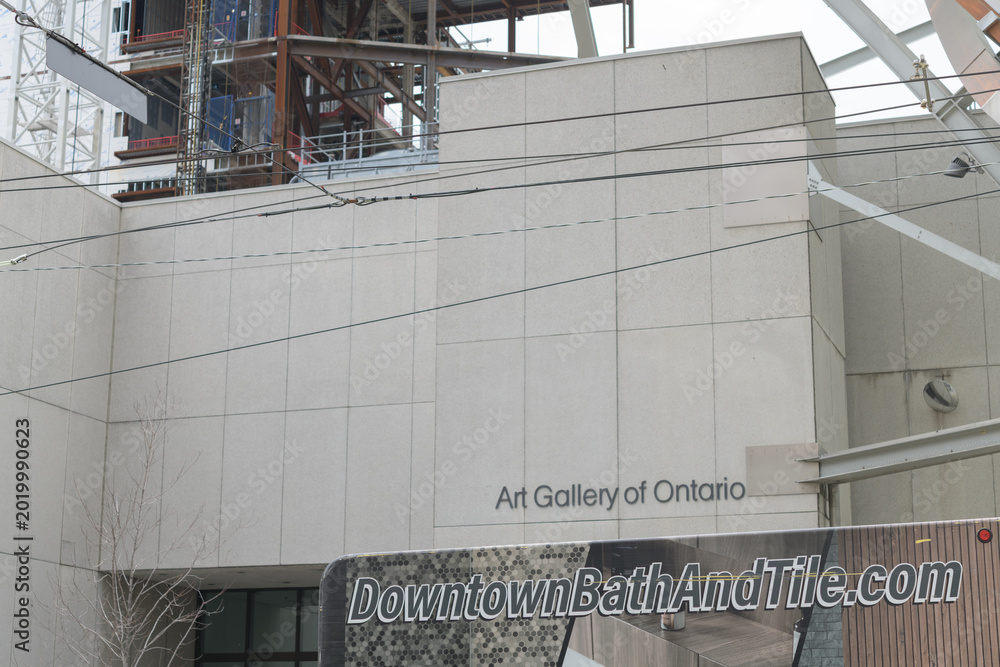 Fototapeta premium Downtown Bath and Tile delivery truck parked outside the Art Gallery of Ontario, 317 Dundas St W and McCaul St, Toronto