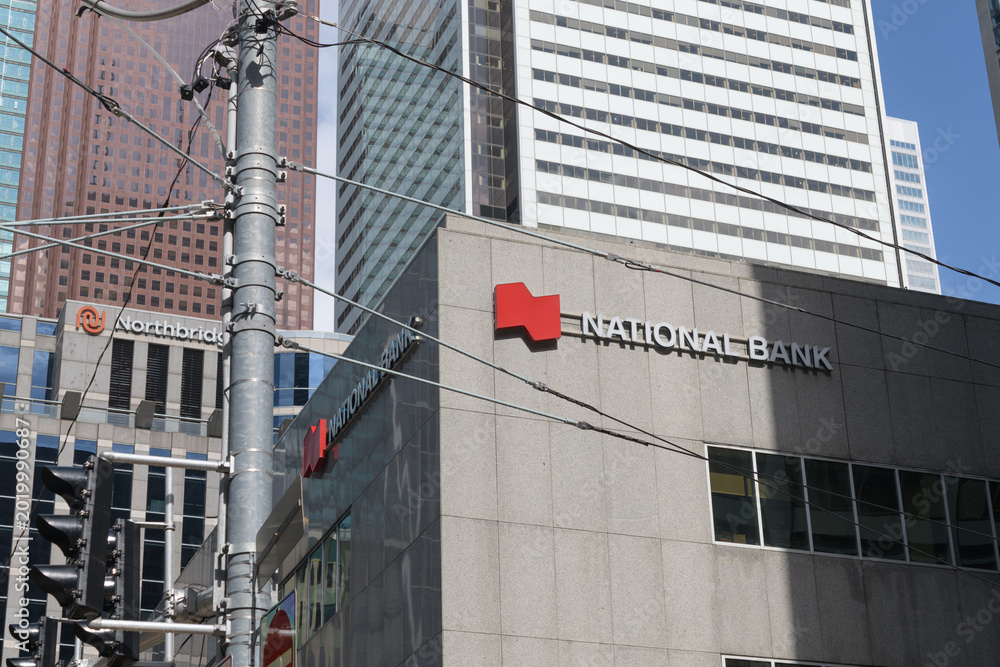 Naklejka premium view of National Bank sign outside 121 King St W, Floor 1 of Roserock Place, Toronto