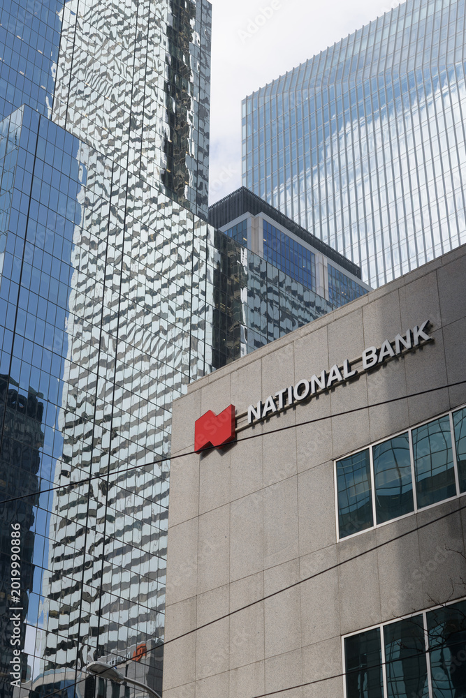 Fototapeta premium view of National Bank sign outside 121 King St W, Floor 1 of Roserock Place, Toronto