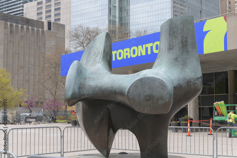 Naklejka premium Henry Moore's Three Way Piece No.2: Archer and FIFA World Cup 2026 tournament branding or host city dressing at Toronto City Hall