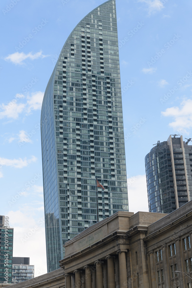 Fototapeta premium west elevation of L Tower, a residential skyscraper, designed by Daniel Libeskind, located at 8 The Esplanade, Toronto