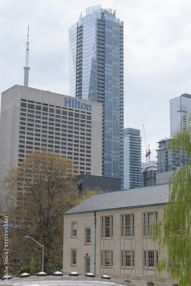 Fototapeta premium contrast of architectural styles (bottom) Osgoode Hall, Hilton hotel (145 Richmond St W), and Shangri-La hotel tower at 188 University Av, Toronto