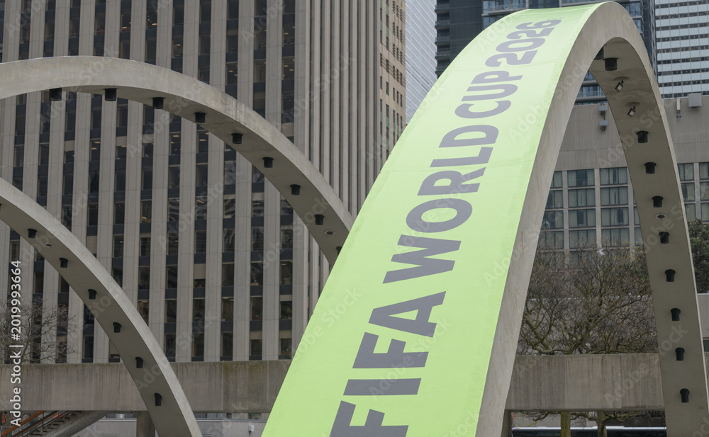 Fototapeta premium FIFA World Cup 2026 tournament branding or host city dressing on Arches at Nathan Phillips Square, Toronto City Hall