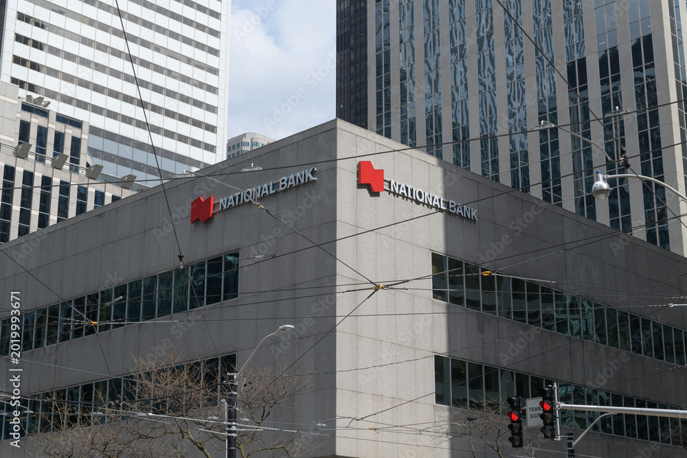 Fototapeta premium view of National Bank sign outside 121 King St W, Floor 1 of Roserock Place, Toronto