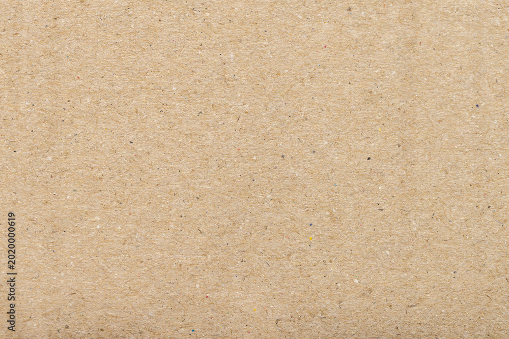 Fototapeta premium Brown Corrugated Cardboard Texture Background with Recycled Paper Fibers,Macro,Close-up macro shot of brown corrugated cardboard texture, showing detailed recycled paper fibers and natural organic.