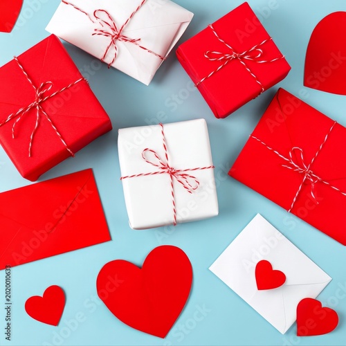 Gift Boxes and Envelopes Arranged on a Blue Surface for a Special Celebration...