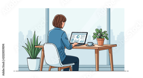 woman sitting at desk with laptop and plants.