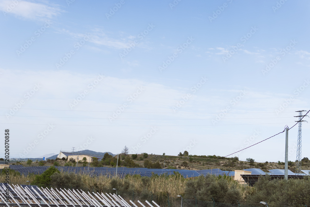 Ταπετσαρία Extensive solar panels creating sustainable energy in a rural field with power l
