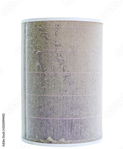 Dirty Cylindrical Air Filter Isolated on White Background. Indoor Air Pollution Concept
