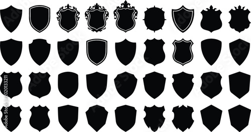 Valokuva Shield silhouette icon vector collection featuring black crest coats of arms security badges heraldic frames and blank protective symbols for logo design