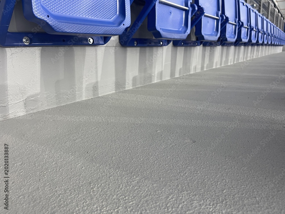 Fototapeta premium benches, stairs and an empty stadium for a sporting event