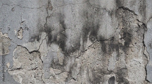 Tableau sur toile Close-up of cracked and weathered concrete wall with mold and mildew stains