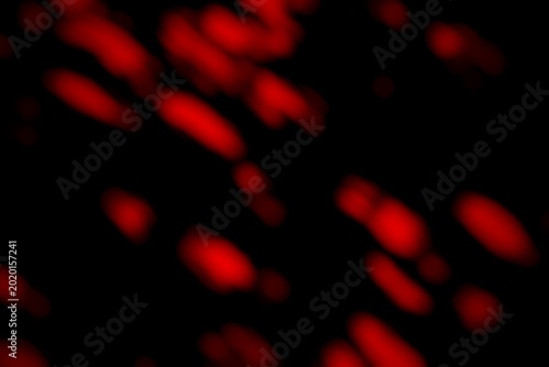 Abstract red bokeh lights creating a vibrant glowing