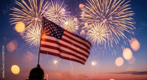 American flag waving against vibrant fourth of july fireworks display