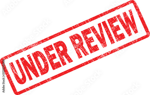 Фотография Red stamp with Under Review text
